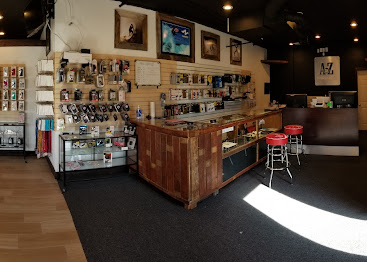 Inside A to Z Wireless — accessory displays, repair counter, and waiting area